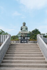 Ancient Buddhist Statue Ascending Stone Stairway