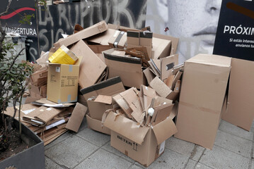 Cardboard Box Pile On Street: Messy Packaging Debris After Move Or Delivery