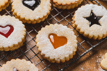 Linzer biscuits on a baking rack
