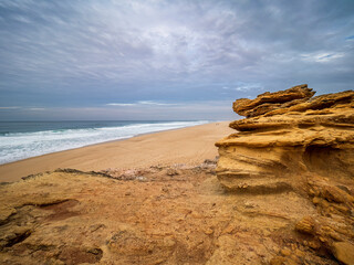 Rugged rock formations overlooking Praia do Norte in Nazar&eacute;