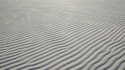 Obraz premium Clean Beach Sand Ripples from Above, Soft Natural Wave Pattern Texture Background 