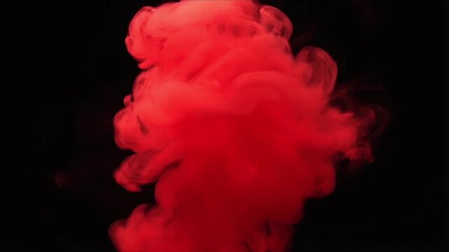 Cinematic red smoke swirling on a black background, slowly morphing into abstract geometric shapes ethereal forms, smooth flow, high contrast, soft lighting, cinematic 4K ultra HD, loopable footage