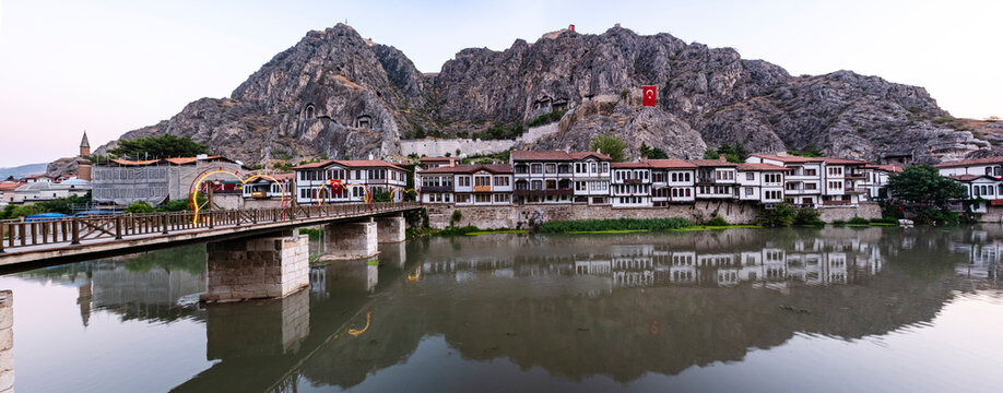 Historical Ottoman Houses Along Yesilirmak River in Amasya, Turkey at Sunrise