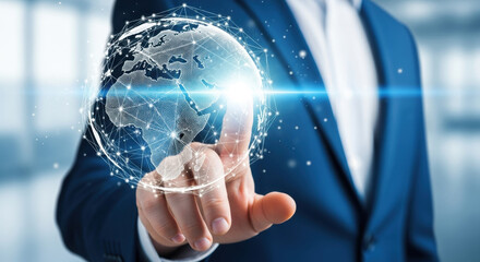 A man in a blue suit is touching a glowing digital globe, symbolizing connection, future technology, and communication. The scene includes lens flare, enhancing the futuristic concept.