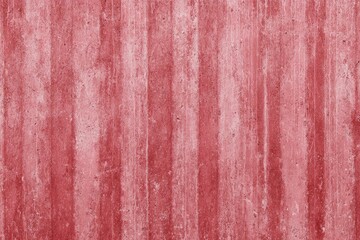 Textured vertical pattern of distressed, faded coral-pink and red stripes