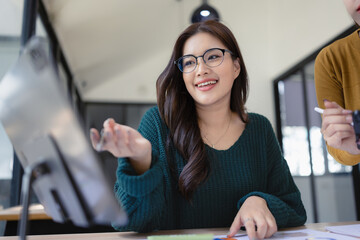 Two businesswoman or creative startup with team in office workplace, business team working together...