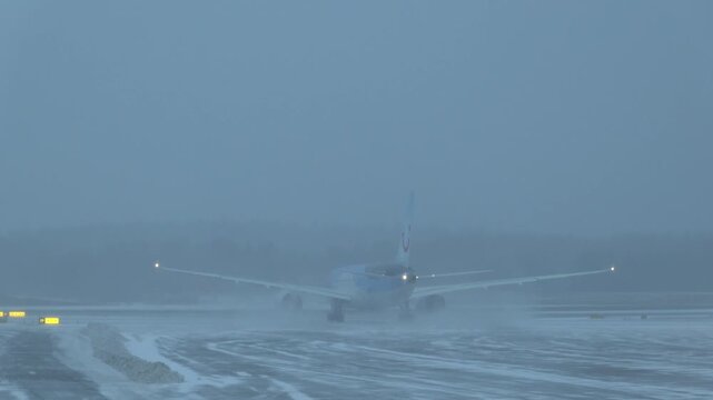 Stockholm, Sweden  Snowplows in winter on the tarmac at Arlanda Airport. 
