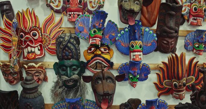 Many old colored Ceylon traditional Wooden masks Sculptures. Sri Lankan Flower Bird Devil (Mal Gurulu Raksha), Fire Devil mask, Gini Raksha, Naga Raksha - Cobra demon - mask of the Raksha Kolama demon