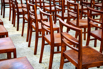 Wooden chairs in the empty meeting room