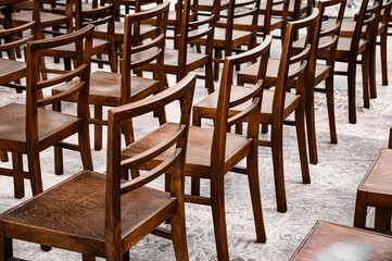 Wooden chairs in the empty meeting room