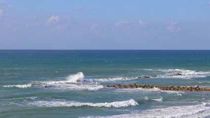 Waves breaking on the rocks in the Mediterranean Sea, Israel.