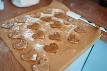 making heart-shaped gingerbread cookies