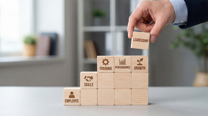 Human resources career growth and employee development concept using stacked cube blocks in structured progression