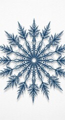Intricate blue snowflake with delicate icy branches and radial symmetry.