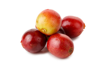 A pile of Red Coffee Cherry isolated on a white background