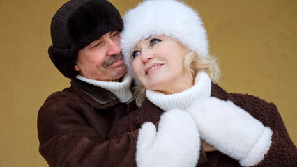 Celebrating Love And Togetherness, Couple Smiling Warmly In Cozy Clothing Celebrating Years Together, Focused Image Of Loving Pair Sharing Joyful Memories During Significant Milestone