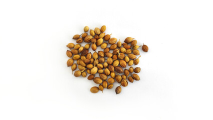 Coriander seeds isolated on white background symbolizing dry spice ingredient, traditional cooking,...