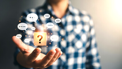 A man holding a question mark with chat bubbles floating around