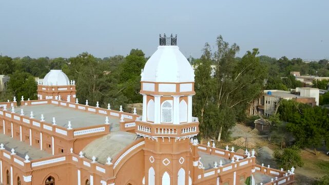 An upclose and aerial view of Bahawalpur's iconic Library building. 