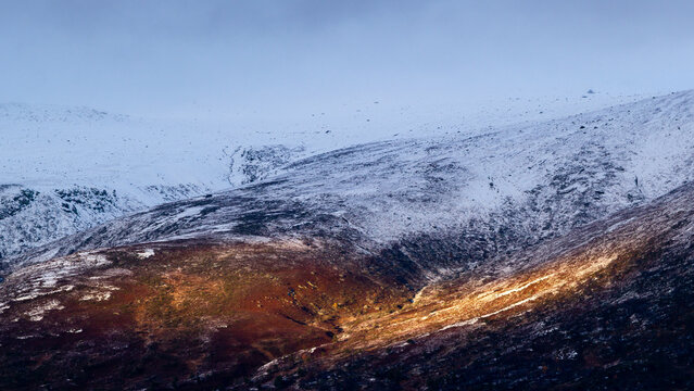 First snow in the Norwegian mountains, beautiful light.