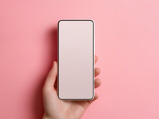 ピンク背景で手に持ったスマートフォンの空白画面がアプリ紹介やWebサービスを想起