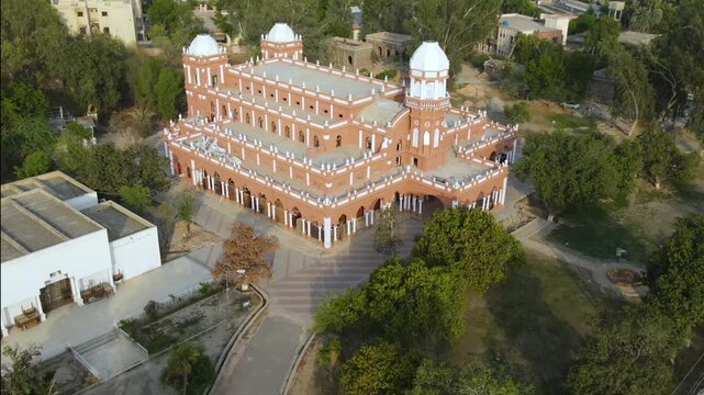 A wide-angle aerial view of Bahawalpur's iconic Library building. 