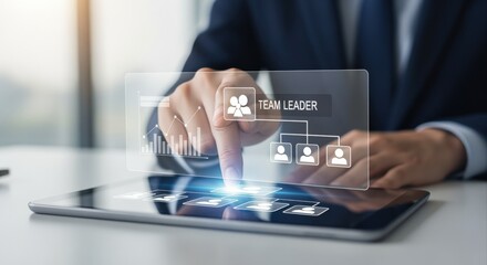 Business Professional Analyzing Team Hierarchy and Leadership Structure on a Tablet Display with Graph Data