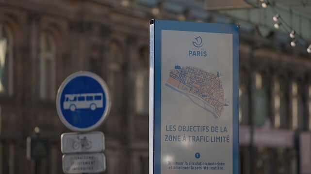 PARIS, FRANCE - DECEMBER 16, 2025 - Ville de Paris street sign explaining objectives of the limited traffic zone