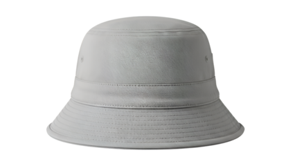 A minimalistic grey bucket hat sits isolated against a stark black backdrop in studio lighting.