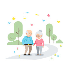 Elderly couple walking hand in hand on a path in a park  