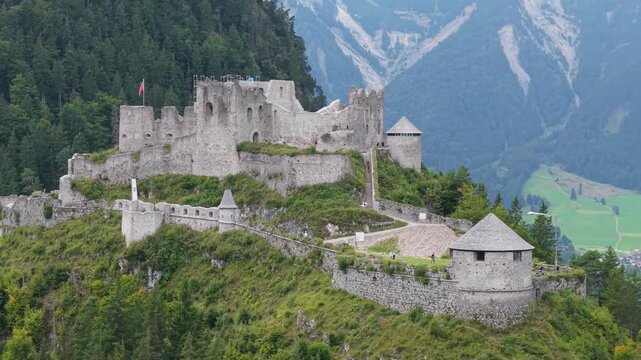 Aerial view of the ruins of Ehrenberg Castle near Highline 179. The castle stands on a peak in the mountains of Tyrol, Austria