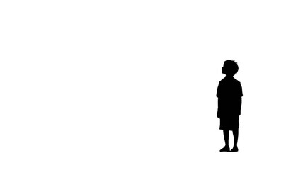 Obraz premium lonely child standing from behid in dark empty space emotional childhood solitude isolated on white background