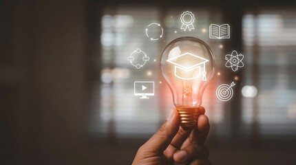 A glowing light bulb held in a hand represents innovative ideas education learning and the pursuit of knowledge with icons surrounding it