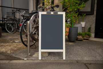 Large blank billboard on a street wall, banners with room to add your own text