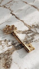Ornate Golden Key on Elegant Marble