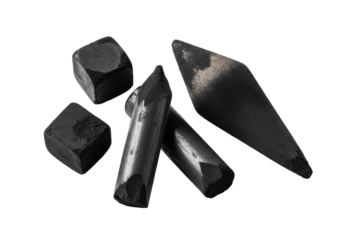 macro flat lay of used artist's charcoal sticks and paper blending stump, covered in matte black dust, dramatically side-lit on a high-key white background. concept of artistic materials and