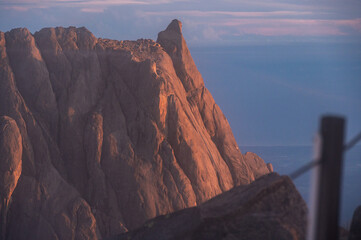 Spectacular view of Victoria peak (4,090 m) has lit by sunlight during morning on Mt Kinabalu the highest mountains in Malaysia.