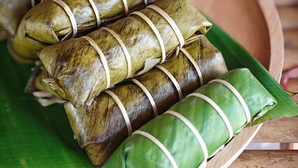 Coconut Sticky Rice Wrapped in Banana Leaves.