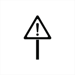 A black silhouette of a warning sign with an exclamation point