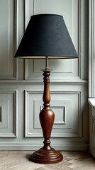 Elegant wood floor lamp with dark shade complements a classically paneled wall beautifully