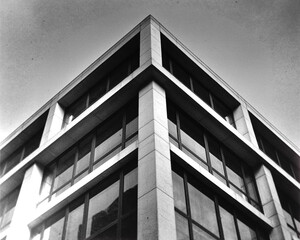 Modern building facade with geometric lines and windows