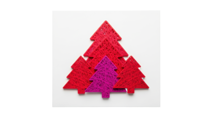 Abstract, layered textural christmas trees in vivid crimson and magenta, flat-lay on transparent surface with copy space against transparent background, minimalist festive banner concept
