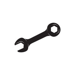 Black wrench tool with open and hexagonal ends on white metal hardware equipment