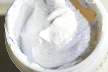 Copper Peptide Powder Being Mixed Into Moisturizing Cream 