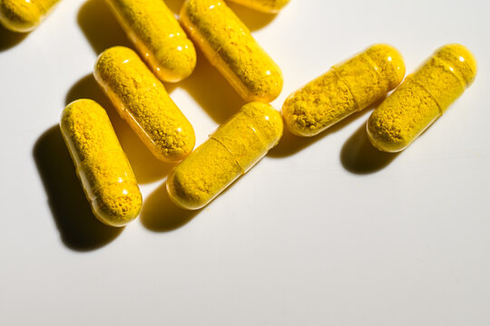 Close up of Berberine Supplement Capsule on White Background