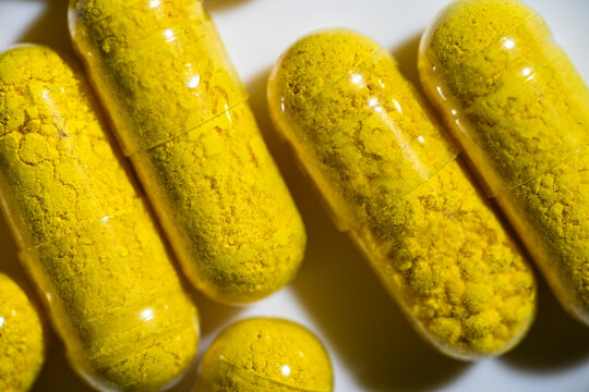 Close up of Berberine Supplement Capsule on White Background