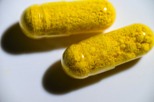 Close up of Berberine Supplement Capsule on White Background
