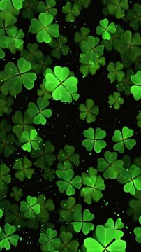 Close-up of fresh green shamrock leaves against a textured green vertical background, capturing the natural beauty and luck of the Irish holiday.