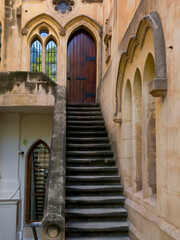 Valletta, Malta &mdash; stone staircase and gothic doorway in a narrow old town lane