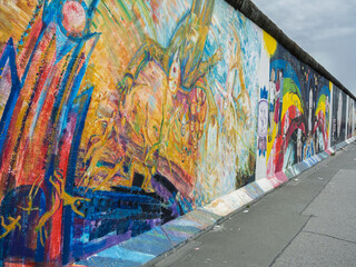 Vibrant Street Art Mural On Historic Berlin Wall, Famous East Side Gallery Artwork, Germany © GioRez